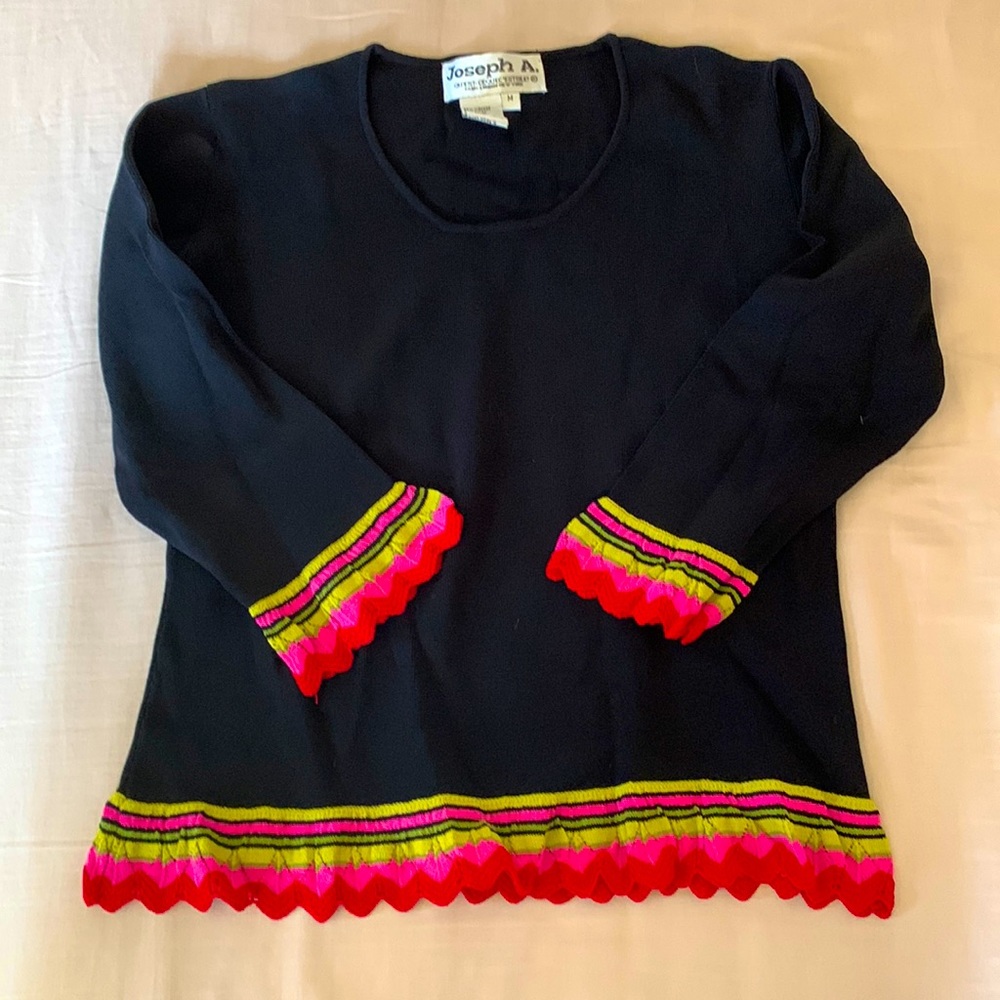 Woman’s black top with bright pink color trim - fun top at great price!